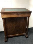 A 19th century mahogany clerk's desk fitted with cupboards beneath, width 103cm.