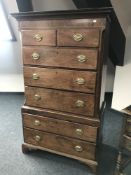 A George III mahogany double chest of seven drawers raised on bracket feet, width 96cm.