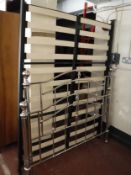 A contemporary chrome 4'6 bed frame