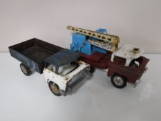 Two mid 20th century Triang tin plate toys - high lift crane and a flat bed lorry