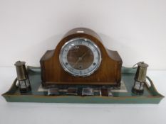 A walnut cased mantel clock,