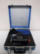 A cased British Gas microphax tester and a box of BT test equipment