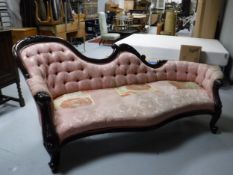 A mahogany framed chaise longue