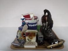 A tray of commemorative crowns, die cast vehicles, Royal Worcester figure,