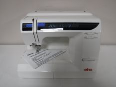 A cased Elna 3005 sewing machine