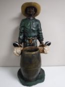 A contemporary Blackamoor style stick stand