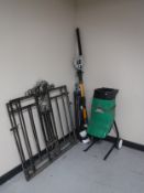 A pair of wrought iron gates, garden shredder,