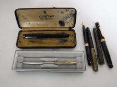 A collection of pens including examples with 14ct gold nibs