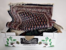 A box of prayer mats,