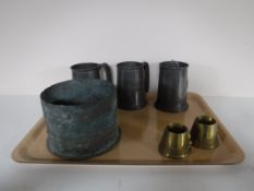 Three George VI Queen Elizabeth commemorative pewter tankards together with ammunition shell casing