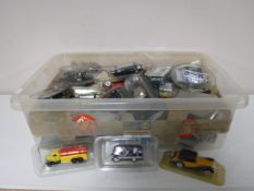 Two boxes of Atlas die cast vehicles and a magazines