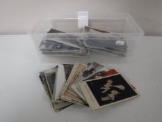 A box of antique postcards