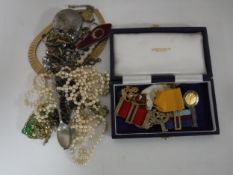 A box of compact, costume jewellery, Albert fob and watch key,