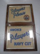 Two Edwardian oak frames containing Players cigarette advertising