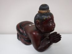 A painted hardwood Eastern stool