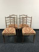 A set of four Victorian inlaid rosewood drawing room chairs