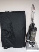 *Lot Withdrawn* A folding portable massage table in carry bag and a Hoover vac cleaner