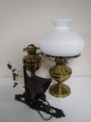 Two brass oil lamps,