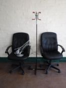 A pair of high backed swivel armchairs together with a 70's hat and coat stand and pair of