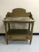 An antique pine washstand