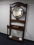 An Edwardian oak hall stand