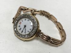 A lady's vintage 18ct gold diamond set cocktail watch on 9ct gold bracelet
