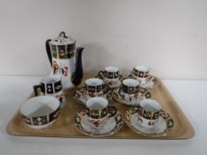 An antique Imari fifteen piece tea service.