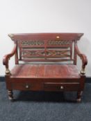 A Chinese style low bench fitted with two drawers