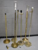 Six brass standard lamps