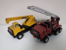Two mid 20th century Triang Meccano tin plate toys including a Mogul fire fighter truck and crane