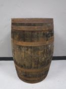 A coopered oak barrel