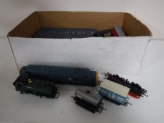 A box of plastic rolling stock.