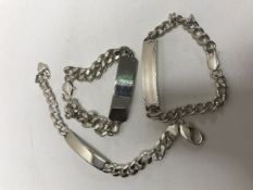 Three silver identity bracelets,