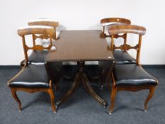A Regency style drop leaf pedestal dining table,