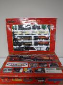 Three battery operated train sets (two boxed)