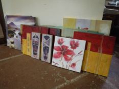 Twelve assorted wall canvases