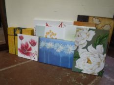 Twelve assorted wall canvases