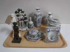 A tray of Robert Olley figure, Italian religious figure, Leonardo figure of a girl reading,