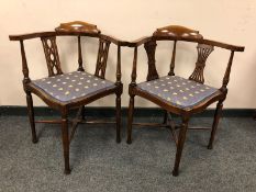 A pair of late Victorian inlaid mahogany corner chairs
