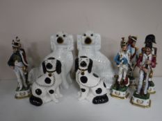 Six Napoleonic style figures and a two pairs of Staffordshire style dogs