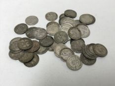 A collection of fifty three penny coins