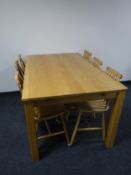 A Danish Haslev design dining table with extension leaf,