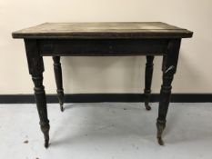 An antique pine kitchen work table fitted with a drawer