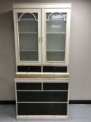 An early twentieth century pine kitchen cabinet