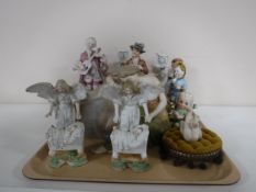 A quantity of continental figures including an Art Nouveau figure,