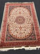 A Keshan rug,