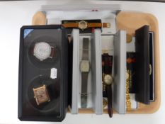 A tray of five boxed wrist watches, Marcel Drucker,