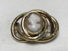 An antique pinchbeck cameo brooch