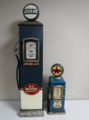 Two storage cabinets in the form of American gas pumps