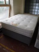 A 4'6 Harmony beds destiny mattress with divan base